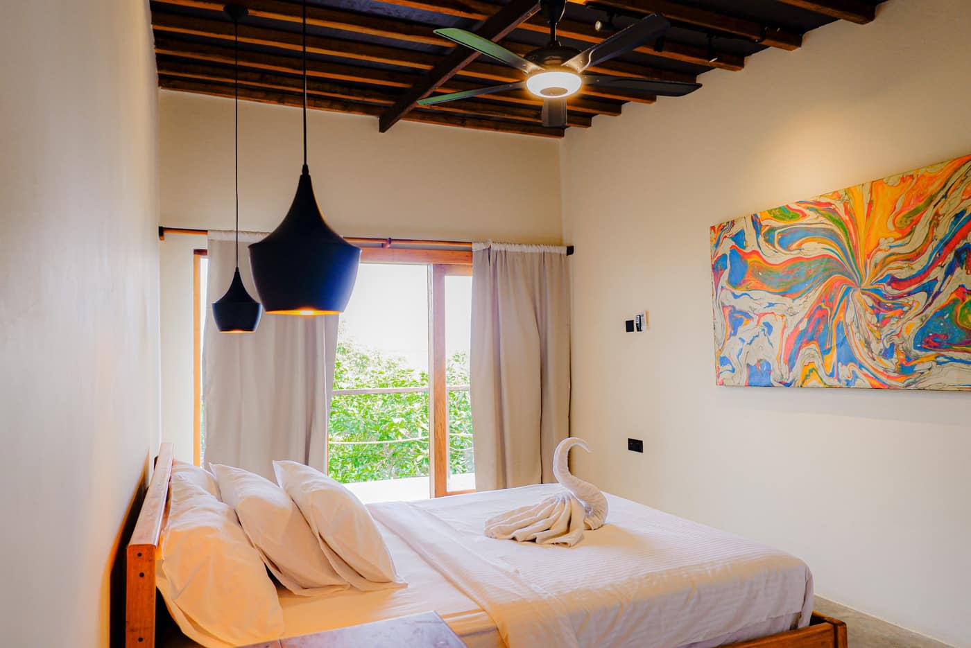 The Langkawi Room — bedroom interior at Seascapes Bira boutique resort